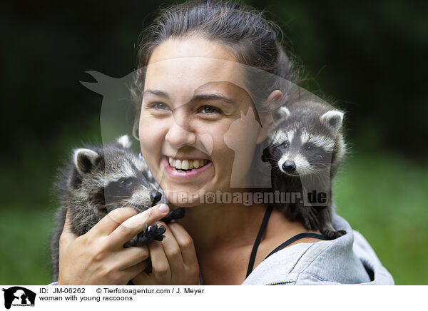 woman with young raccoons / JM-06262