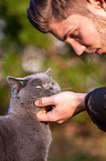 Man with British Shorthair