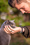 Man with British Shorthair