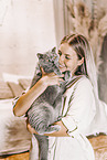 young woman with British Shorthair