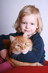 kid and domestic cat