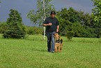 man and Airedale Terrier