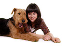 young woman with Airedale Terrier