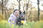 woman and Australian Cattle Dog