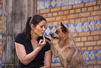 young woman with Australian Cattle Dog