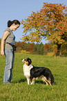 young woman with Australian Shepherd