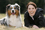 woman and Australian Shepherd