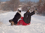 man and Australian Shepherd