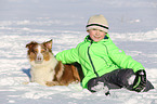 boy and Australian Shepherd