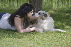 woman and Australian Shepherd