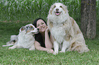 woman and Australian Shepherds