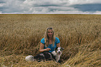 woman and Australian Shepherd