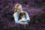 woman with Australian Shepherd