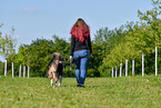 woman with Australian Shepherd