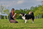 woman with Australian Shepherd