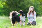 woman with Australian Shepherd