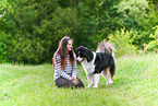 woman with Australian Shepherd