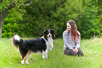 woman with Australian Shepherd