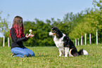 woman with Australian Shepherd