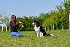 woman with Australian Shepherd