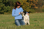 woman and Border Collie