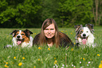 woman and 2 dogs