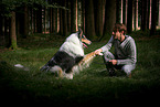 man and longhaired Collie