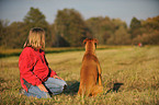 girl and German Boxer