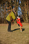 woman and German Boxer