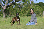 woman and German Boxer