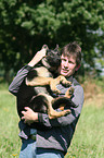 man and German Shepherd