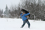 man and German Shepherd