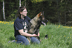 woman with German Shepherd