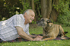 man and German Shepherd