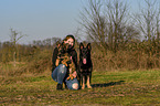 woman with German Shepherds