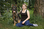 woman and German Shepherd GDR