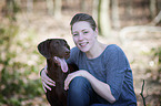 woman and German shorthaired Pointer