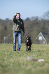 man and German shorthaired Pointer