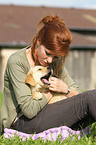 woman with Golden Retriever Puppy