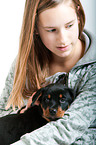 girl with Great Swiss Mountain Dog puppy