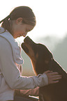 girl and Great Swiss Mountain Dog