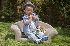 Child and Jack Russell Terrier Puppy