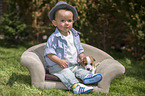 Child and Jack Russell Terrier Puppy