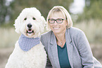woman and Labradoodle