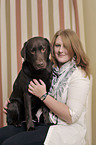 woman and Labrador Retriever