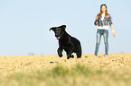 girl with Labrador Retriever