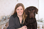 woman and Labrador Retriever