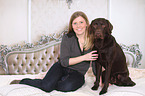 woman and Labrador Retriever