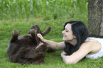 woman and Labrador Retriever