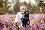 child and Labrador Retriever